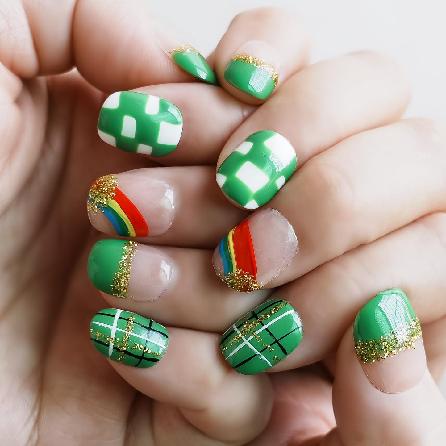 Tesytto Extra Short Press On Nails - Nude Base with Green French Tips & Gold Glitter, Hand-Painted Plaid & Rainbow,Easy to Apply & Remove (Size M)