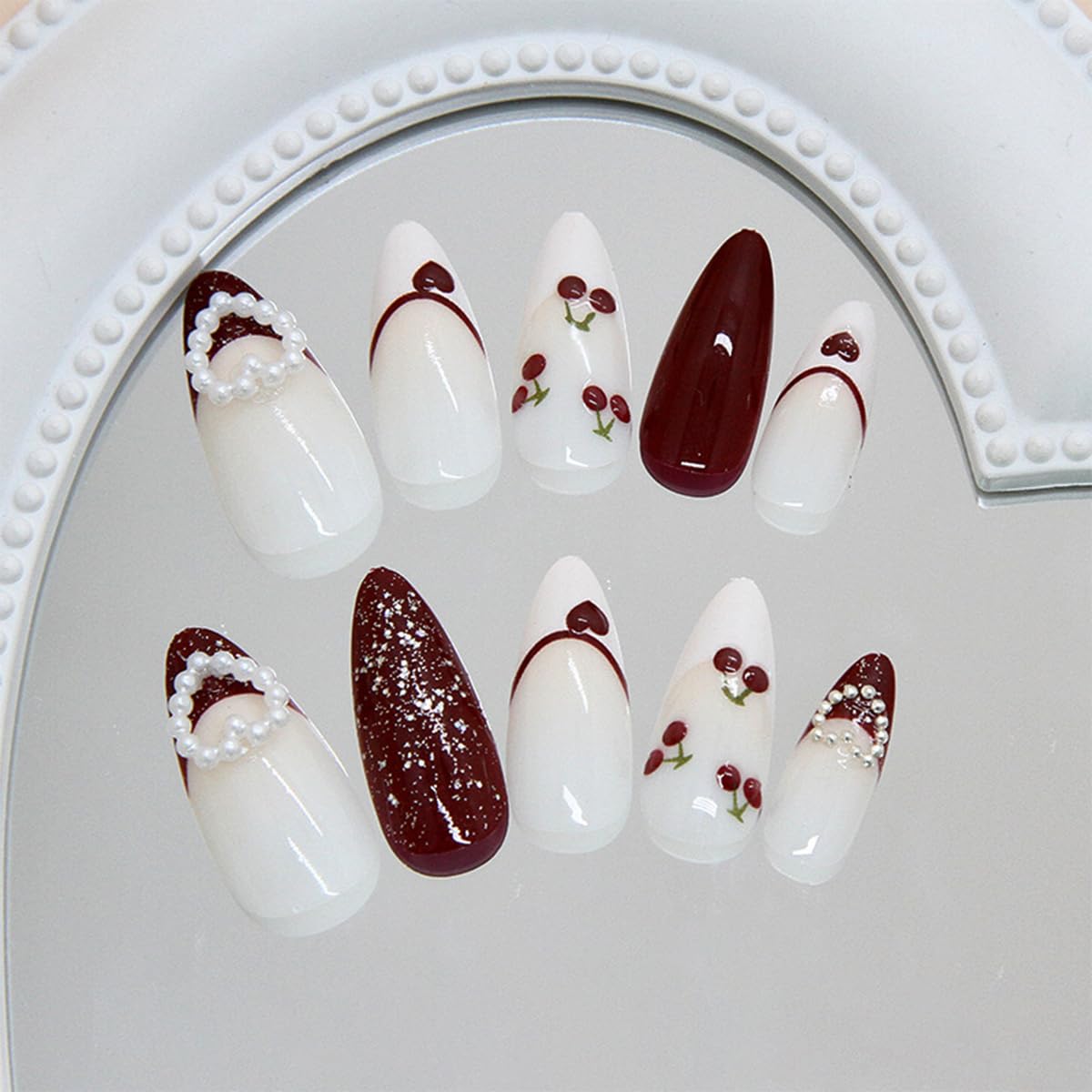 24Pcs Valentines Press on Nails Medium Almond Fake Nails with White Bow Cherry Heart Designs Artificial Acrylic Glue on Nails Red French Tip False Nails 3D Pearl Full Cover Stick on Nail for Women
