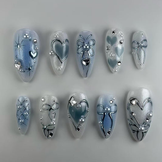 24Pcs Y2k Almond Fake Nail Medium Press on Nails with Blue Love Heart Silver Bow Butterfly Design French Press On Nail Flash Full Cover Artificial Glue on Nails Pearl Rhinestones Nails for Women