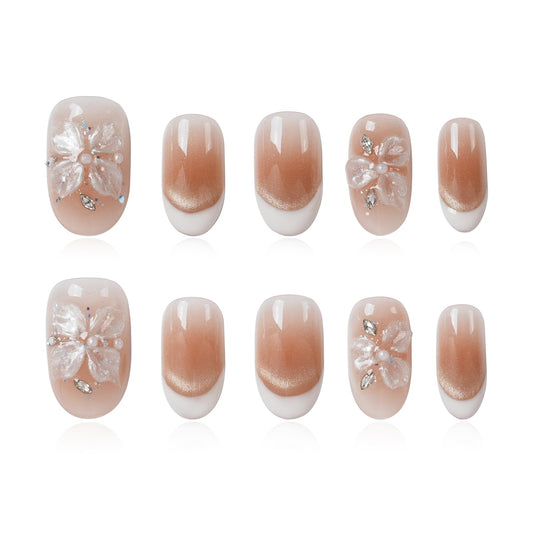 Tesytto Short Oval Press On Nails, Nude Cat Eye Gradient False Nails with White French Tip & 3D Sheer Flower, Reusable Glossy Fake Nails (Gold Shimmer Crystal,M)