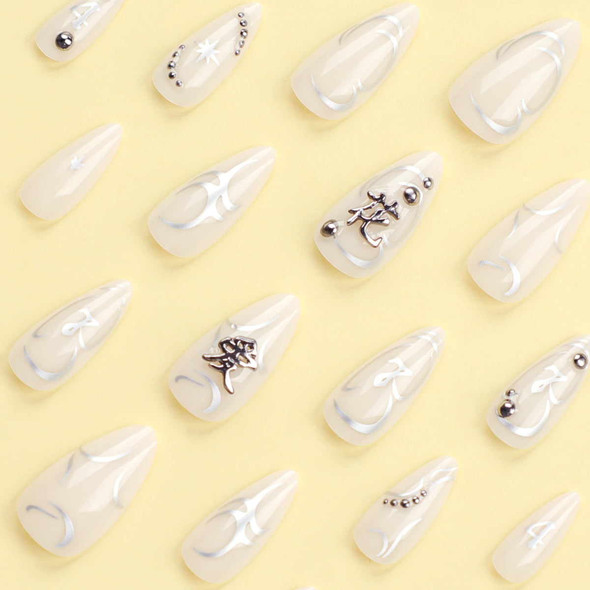 IMSOHOT Almond Press on Nails Medium Fake Nails White Glossy Acrylic False Nails with Metal Charms Designs Full Cover Silver Flame Stiletto UV Artificial Nails for Women and Girls