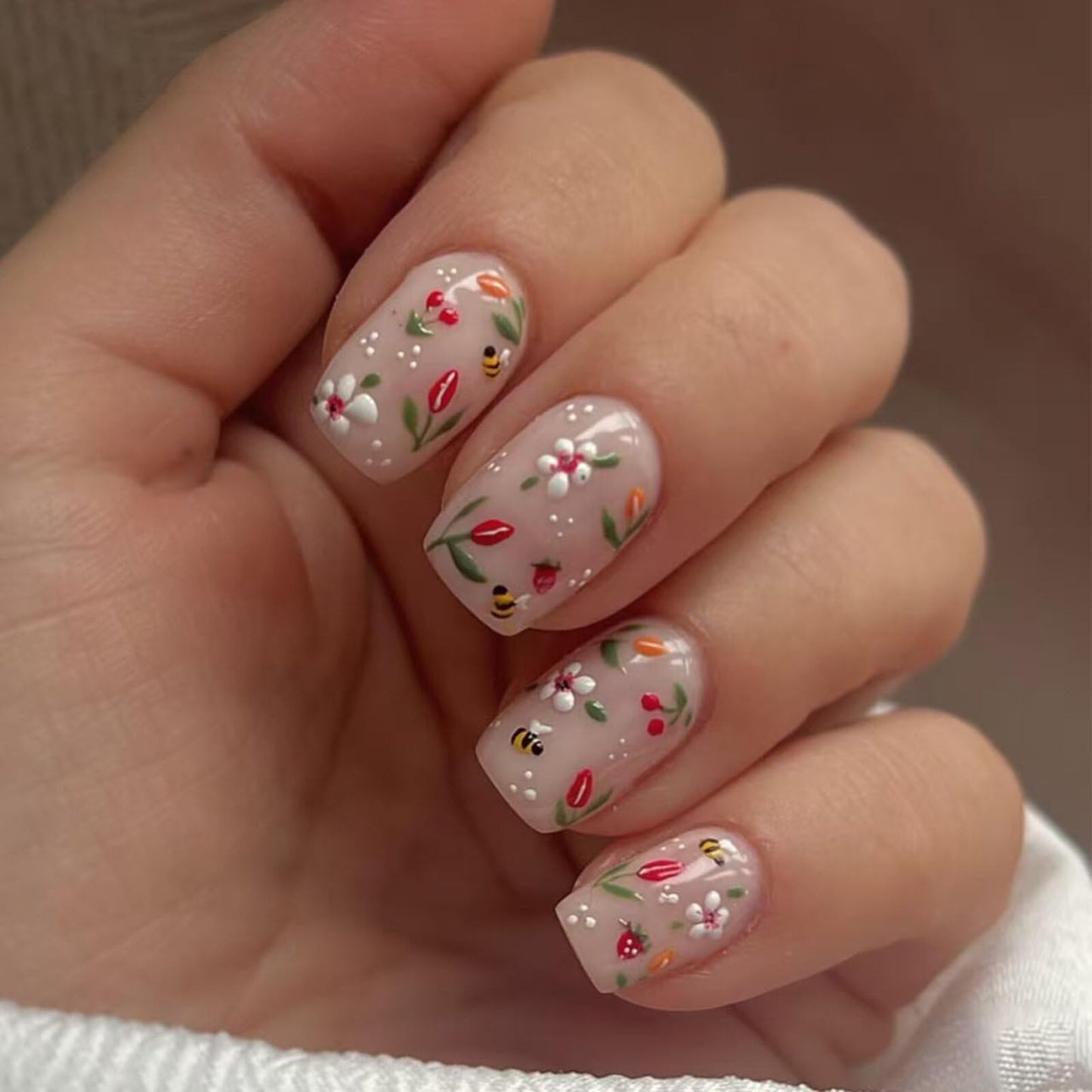 Floral Medium Square Press on Nails Soft Nude Base Multi color Floral Bee Strawberry Accents Glossy Finish Reusable Spring Nails Easy Apply Fashion Wear Durable Trendy Women Girls Nail Art 24 Pcs