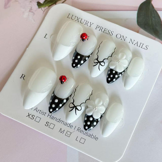 Haozerart Handmade Press on Nails, Medium Almond Shape Fake Nails, Black French Tip with White Polka Dot, Cute Reusable False Nails 10Pcs for Women & Girls (M Size)