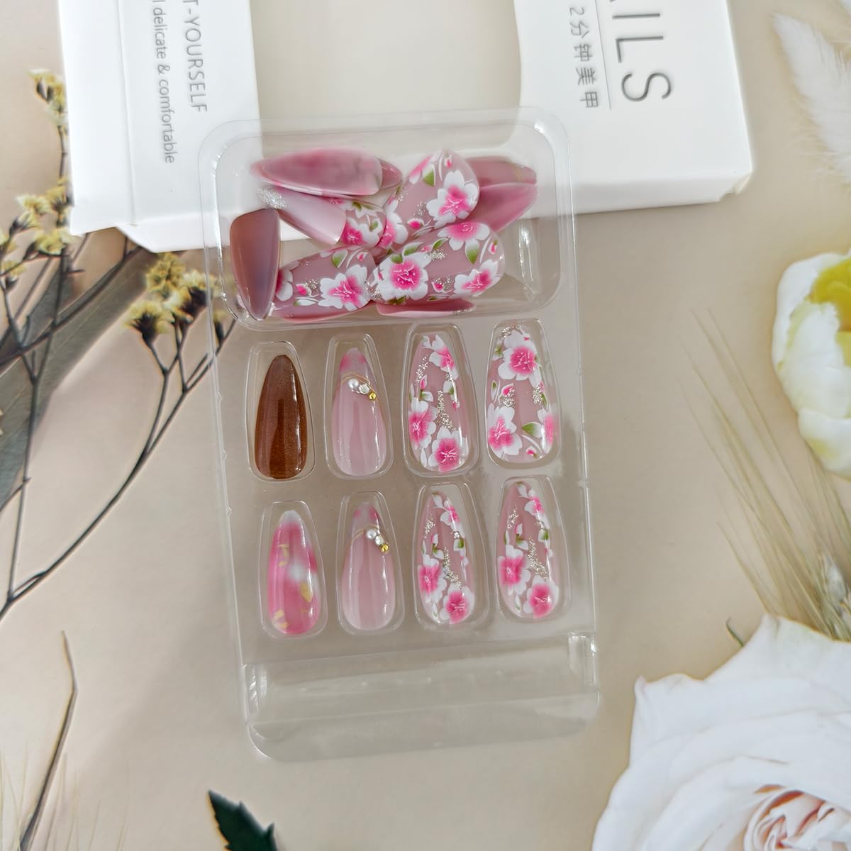 24Pcs Pink Peach Blossom Press on Nails Almond Medium Fake Nails with Flower Designs Glitter 3D Pearl Rhinestones Glue on Nails Pink Floral Acrylic Nails for Women Spring Summer Nail Art Decoration
