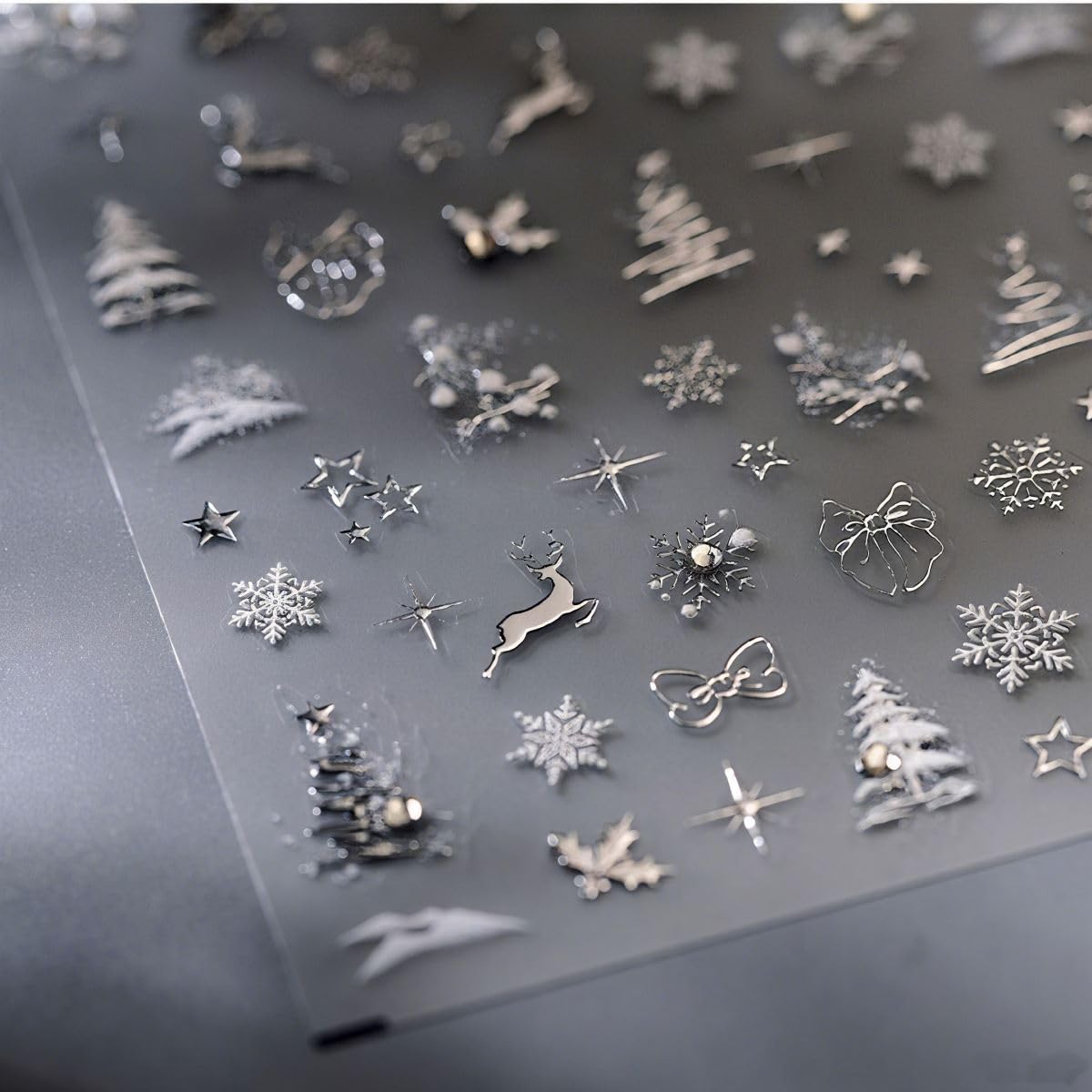 Christmas Nail Art Stickers 5D Embossed Christmas Nail Stickers Xmas Tree Snowflake Bow Deer Star Nail Decals Winter Self-Adhesive Silver Nail Art Supplies for Women Girls New Year Manicure 1 Sheet
