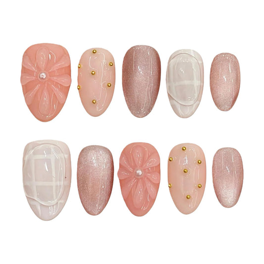 Tesytto Nude Pink Press on Nails Short Almond Cat Eye Fake Nails with 3D Sleek Water Drop Design Glossy Finish Glitter Full Cover Acrylic Nails (Ice Flowers,S)