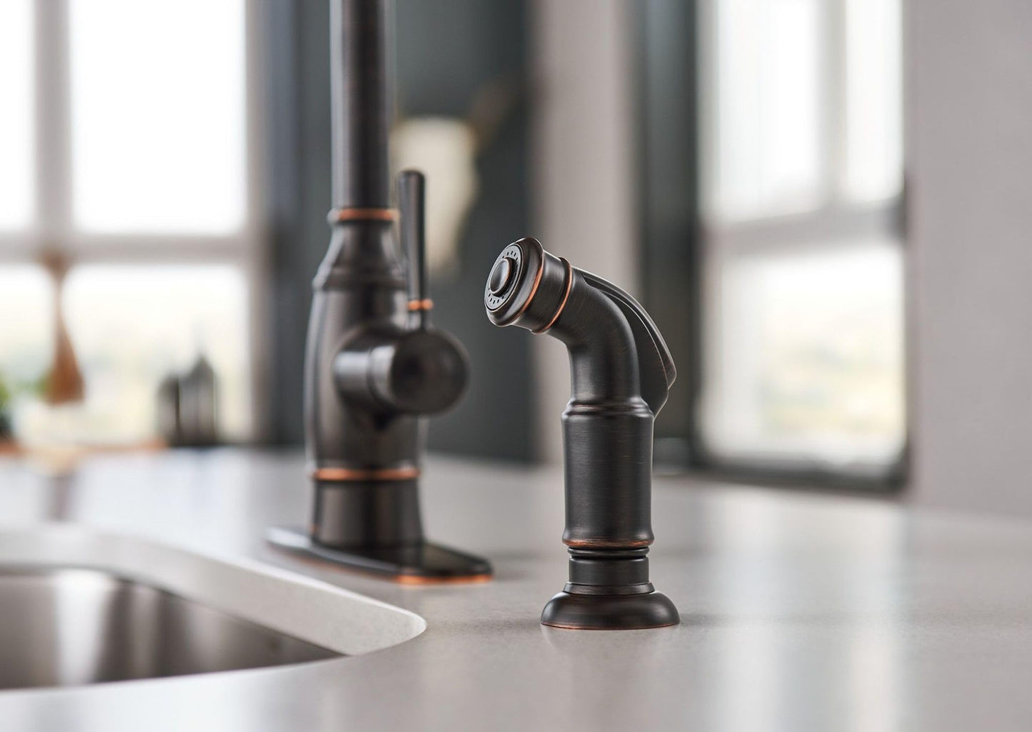 Moen Noell Mediterranean Bronze Single-Handle Kitchen Faucet with Side Sprayer, 87506BRB