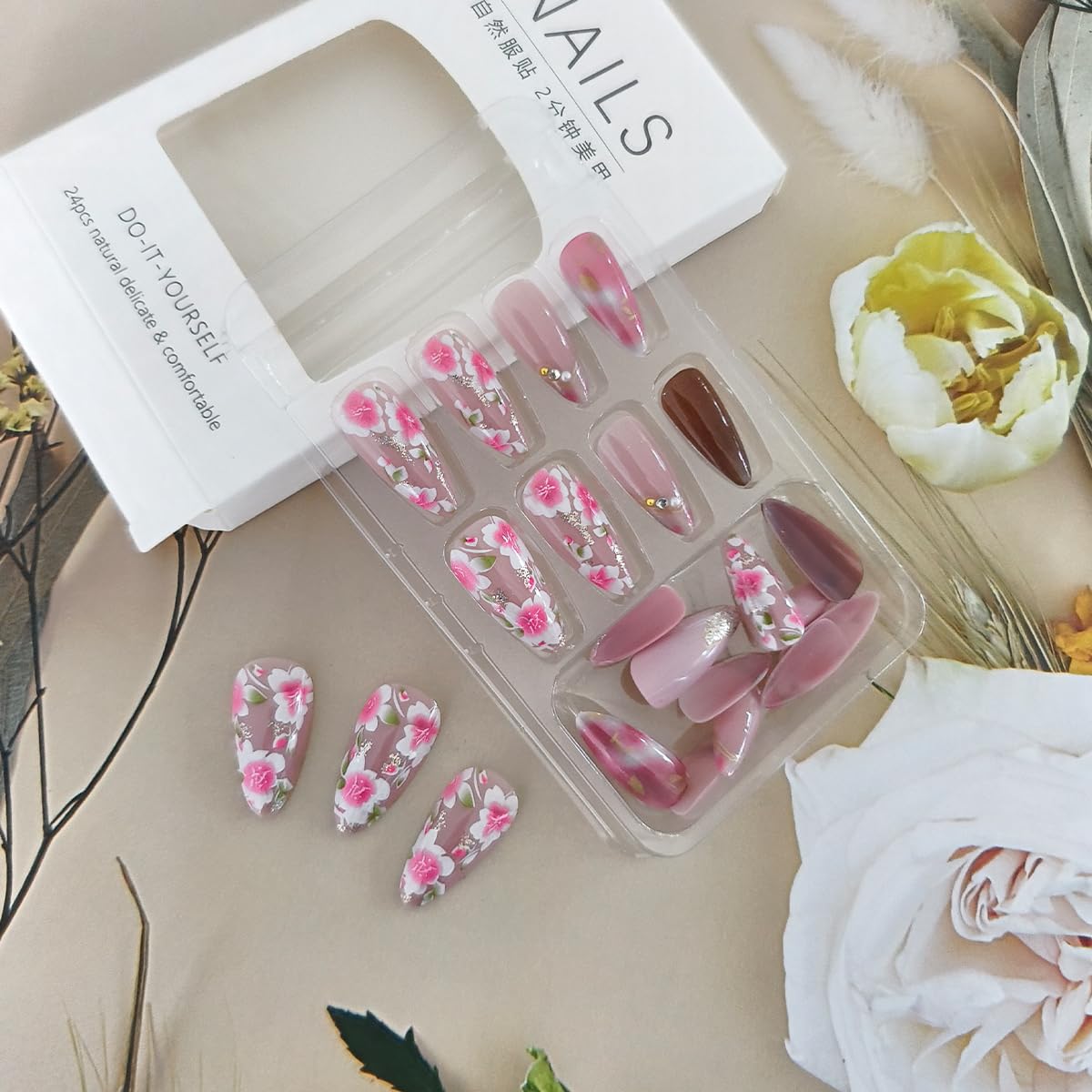 24Pcs Pink Peach Blossom Press on Nails Almond Medium Fake Nails with Flower Designs Glitter 3D Pearl Rhinestones Glue on Nails Pink Floral Acrylic Nails for Women Spring Summer Nail Art Decoration