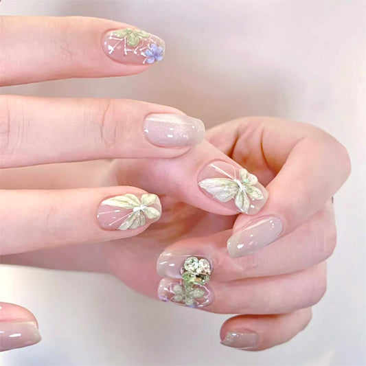 24Pcs Flower Butterfly Press on Nails Medium Fake Nails 3D Charm Gems Full Cover Acrylic False Nail Sparkling Glue on Artificial Nails Glossy Stick on Nail Nude Pink Press on Finger Nail Set for Women