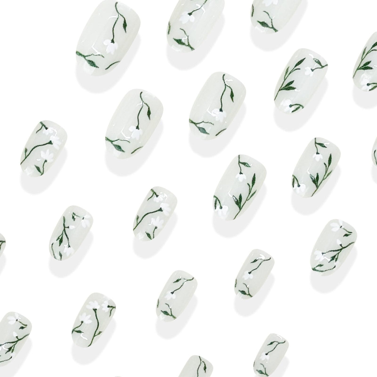 Floral Medium Oval Press on Nails Milky White Base White Floral Accents Green Vine Details Glossy Finish Reusable Spring Nails Easy Apply Wear Durable Trendy Women Girls Nails Art 24 Pcs