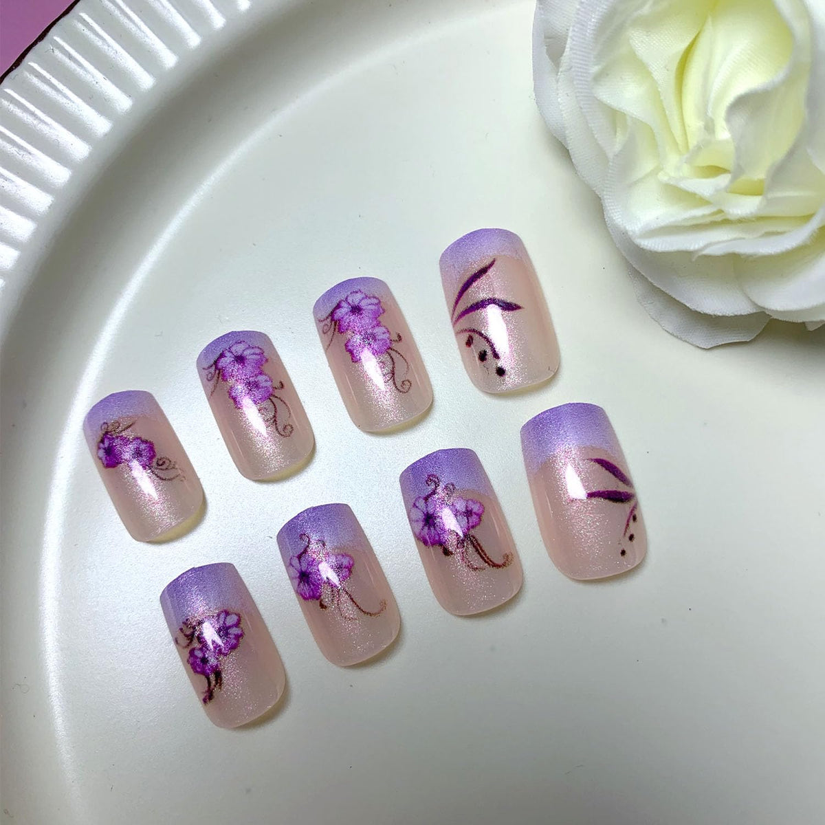 French Press on Nails Medium Short Fake Nails with Glitter Designs Purple Flowers Glue on Nails Translucent Nails Press ons Spring False Nails for Women 24 Pcs