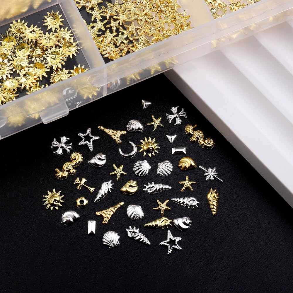 Gold Silver Nail Charms 3D Alloy Flower Nail Gems Ocean Beach Starfish Seashell Nail Jewels Multi-Shapes Metal Sun Moon Star Nail Art Supplies with Tweezer for Women DIY Acrylic Nail 24 Grids 1 Box
