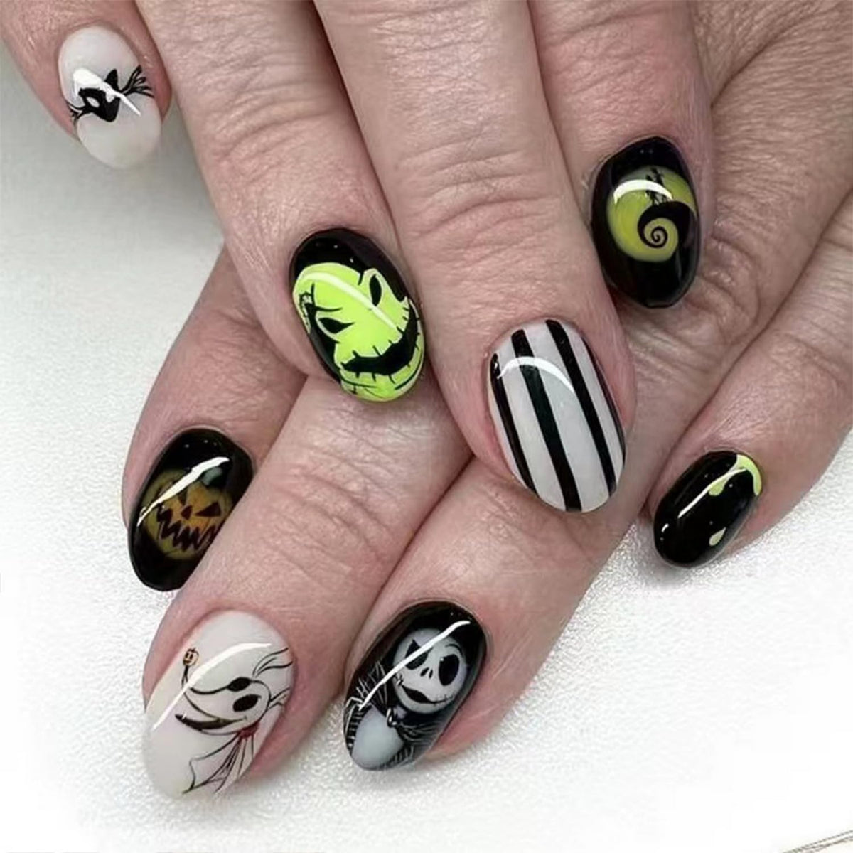 Halloween Press on Nails Short Almond Fake Nails with Skeleton Bat Pumpkin designs Spooky Nails Glossy Stick on Nails Black White Stripe False Nails Glue on Nails for Women Halloween Press ones 24pcs