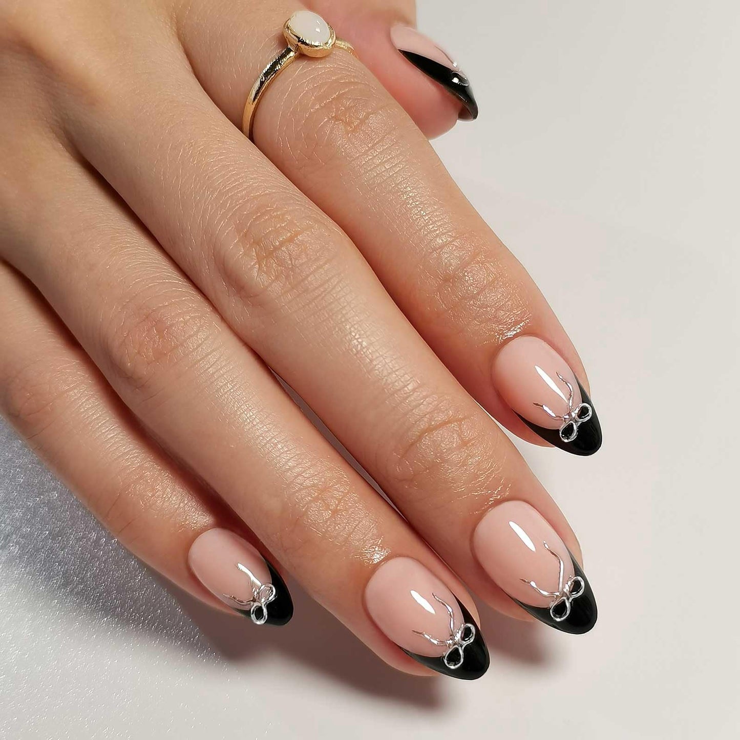 RPNZL Press On Nails - Black Tie | Black French Tip Press on Nails with 3D Bow Design - Soft Gel Almond Fake Nails I 32 Nails, 16 Sizes Kit with Glue and Adhesive Tabs I Female Founded