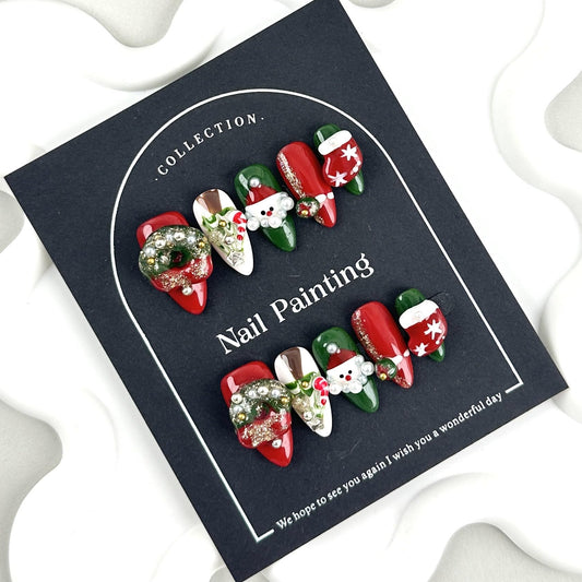 Christmas Press on Nails Handmade Medium Almond Fake Nails with Green Red Wrearh Design Santa Claus Hat Canes Glue on Nails Reusable Winter Handmade Nails for Women Girls Manicure Size M