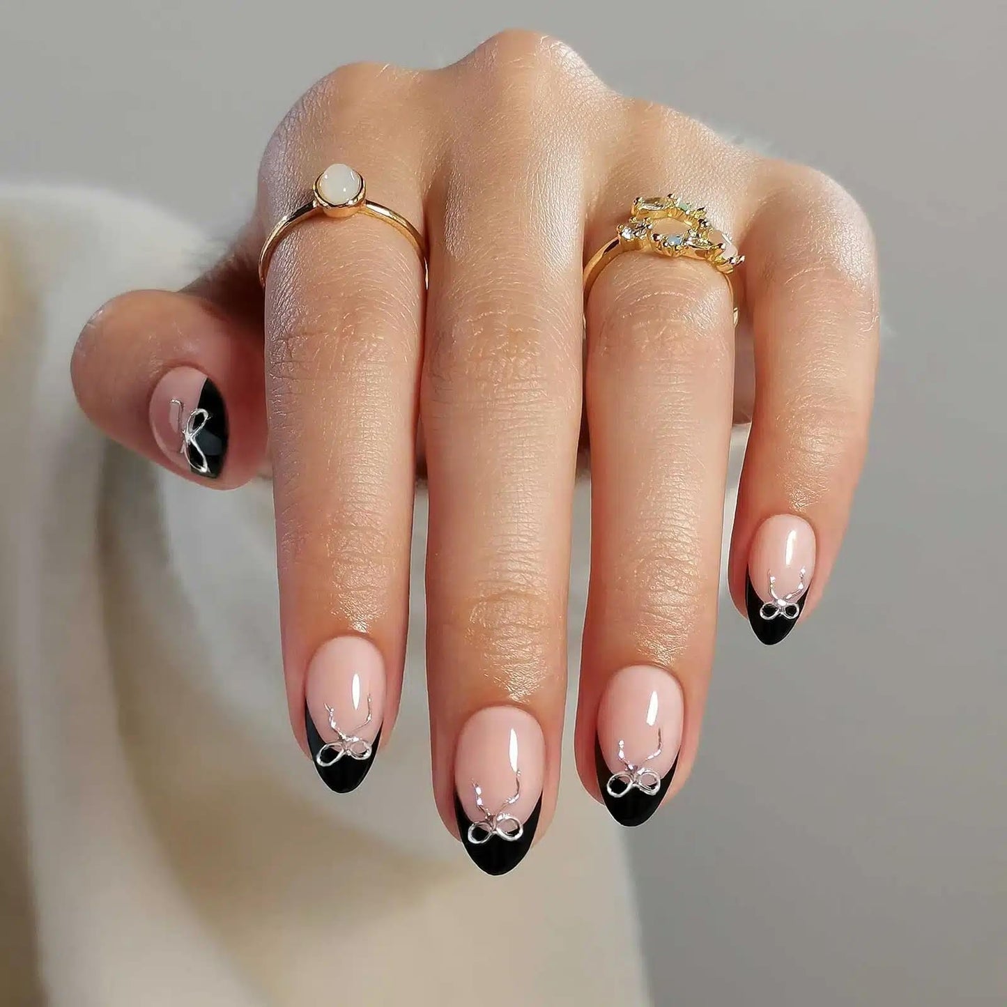 RPNZL Press On Nails - Black Tie | Black French Tip Press on Nails with 3D Bow Design - Soft Gel Almond Fake Nails I 32 Nails, 16 Sizes Kit with Glue and Adhesive Tabs I Female Founded