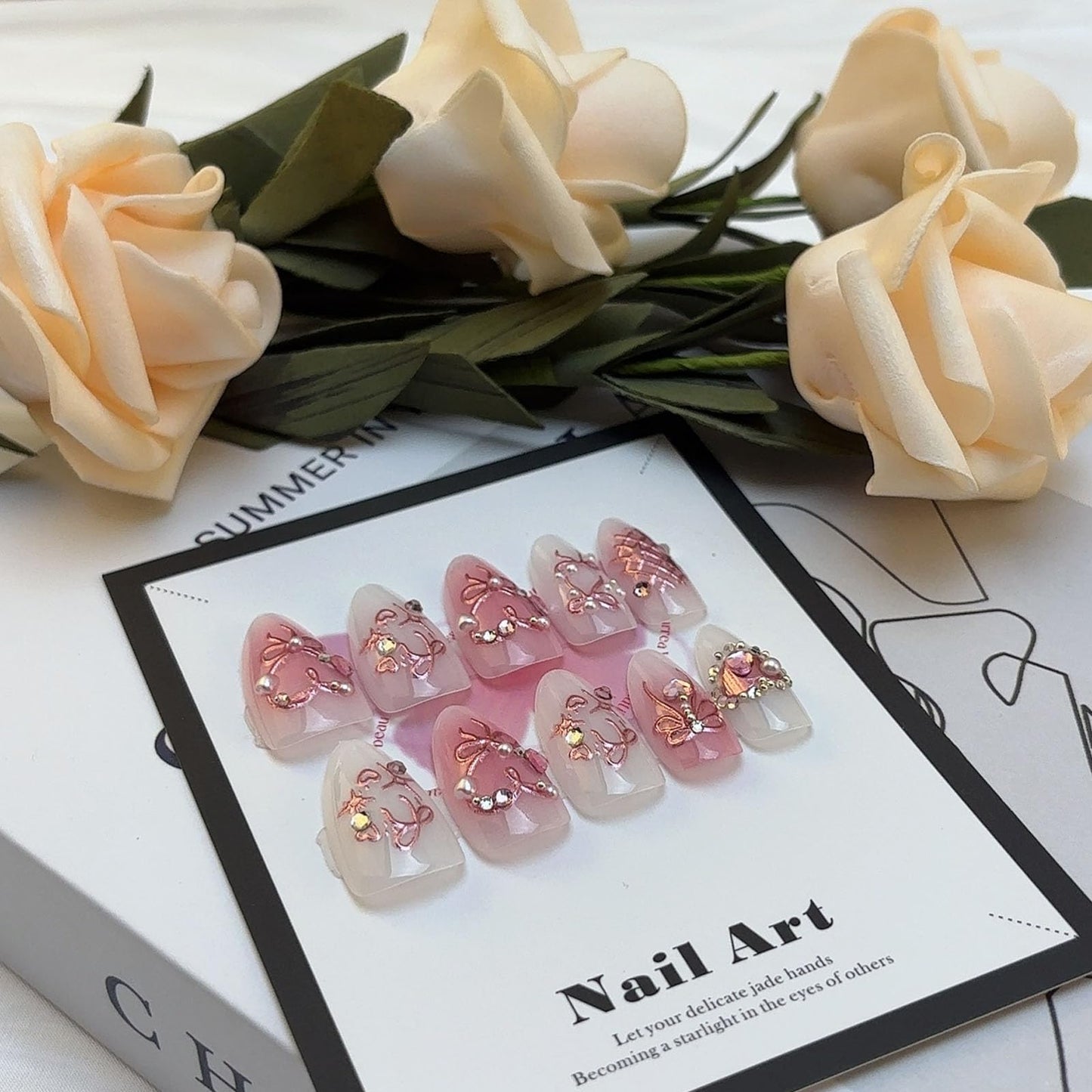 LBPEPAMZ Pink Press on Nails Medium Almond Fake Nails with 3D Heart Pearl Rhinestones Designs White Gradient Bow Silver Star Stick on Nails Flower Charms Full Cover Glue on Nails for Women Girls 24Pcs