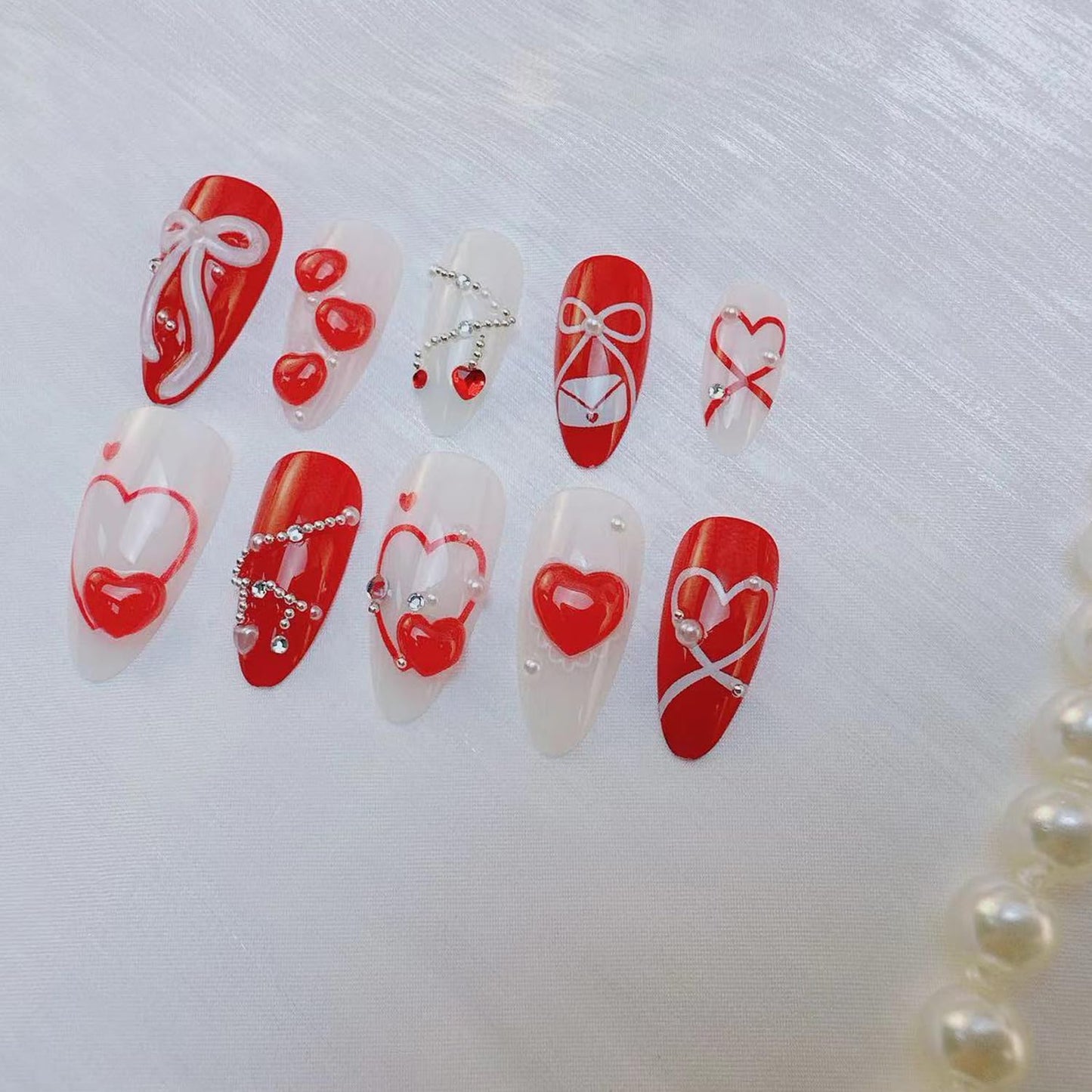 24Pcs Valentine's Love Press on Nails Almond Red Heart Fake Nails with 3D Bow Rhinestones Design French Tip False Nail White Pearl Stick on Nails Hearts Romantic Y2k Handmade Nail for Women