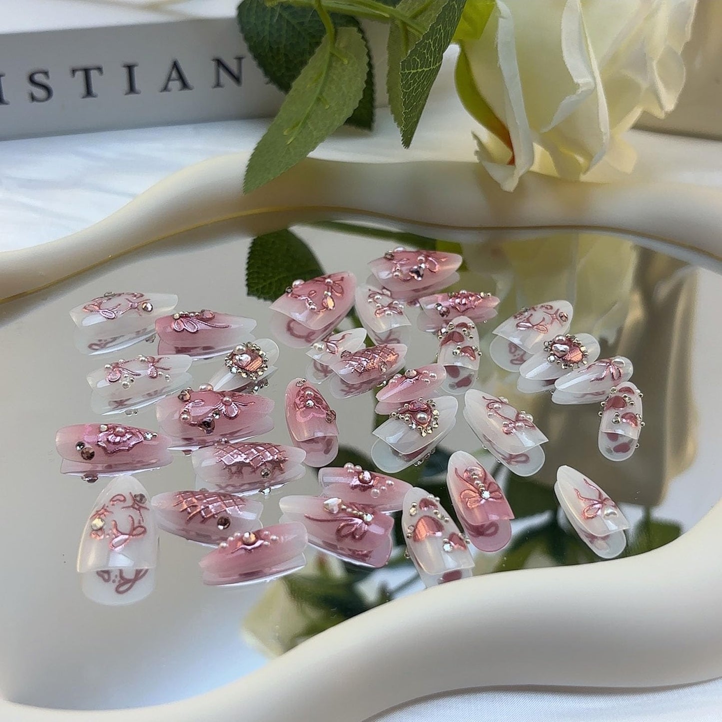 LBPEPAMZ Pink Press on Nails Medium Almond Fake Nails with 3D Heart Pearl Rhinestones Designs White Gradient Bow Silver Star Stick on Nails Flower Charms Full Cover Glue on Nails for Women Girls 24Pcs