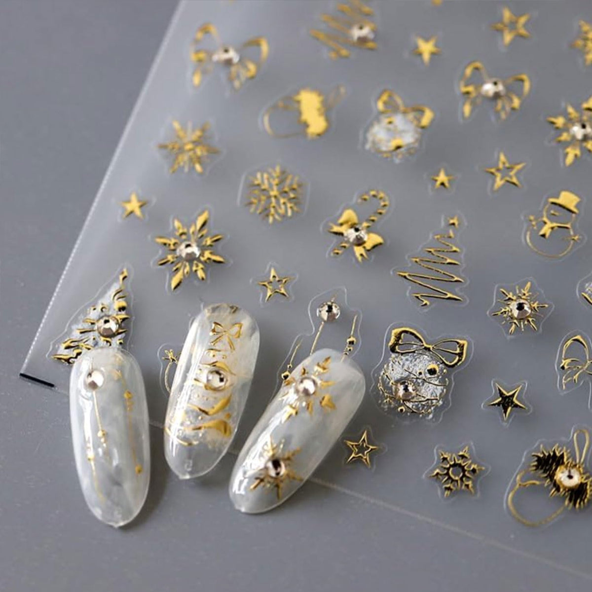 Christmas Nail Art Stickers Gold Nail Stickers Snowflake Snowman Xmas Tree Nail Decals Star Bow with Rhinestones Design 5D Embossed Nail Art Supplies for Winter Holiday Manicure Decorations