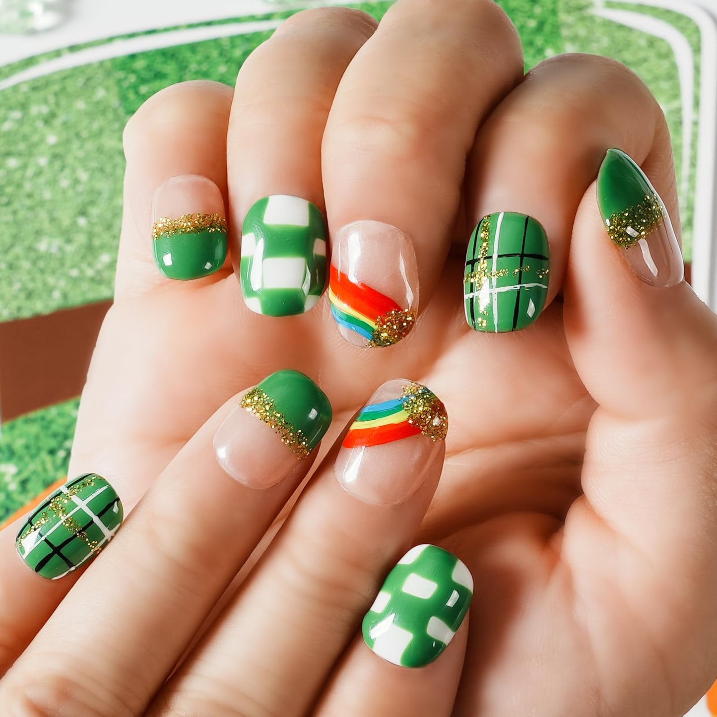 Tesytto Extra Short Press On Nails - Nude Base with Green French Tips & Gold Glitter, Hand-Painted Plaid & Rainbow,Easy to Apply & Remove (Size M)
