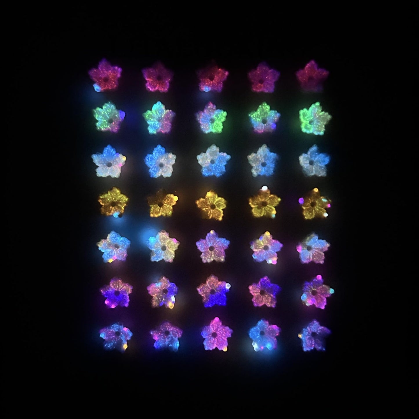 AWDSLUY 200Pcs Colorful Flower Nail Art Charms Cute Spring Summer Floral Nail Charms 3D Mix Color Ombre Flatback Nail Rhinestones Cute Glow in The Dark Blossoms Resin Nails Jewels Nail Gems for Women