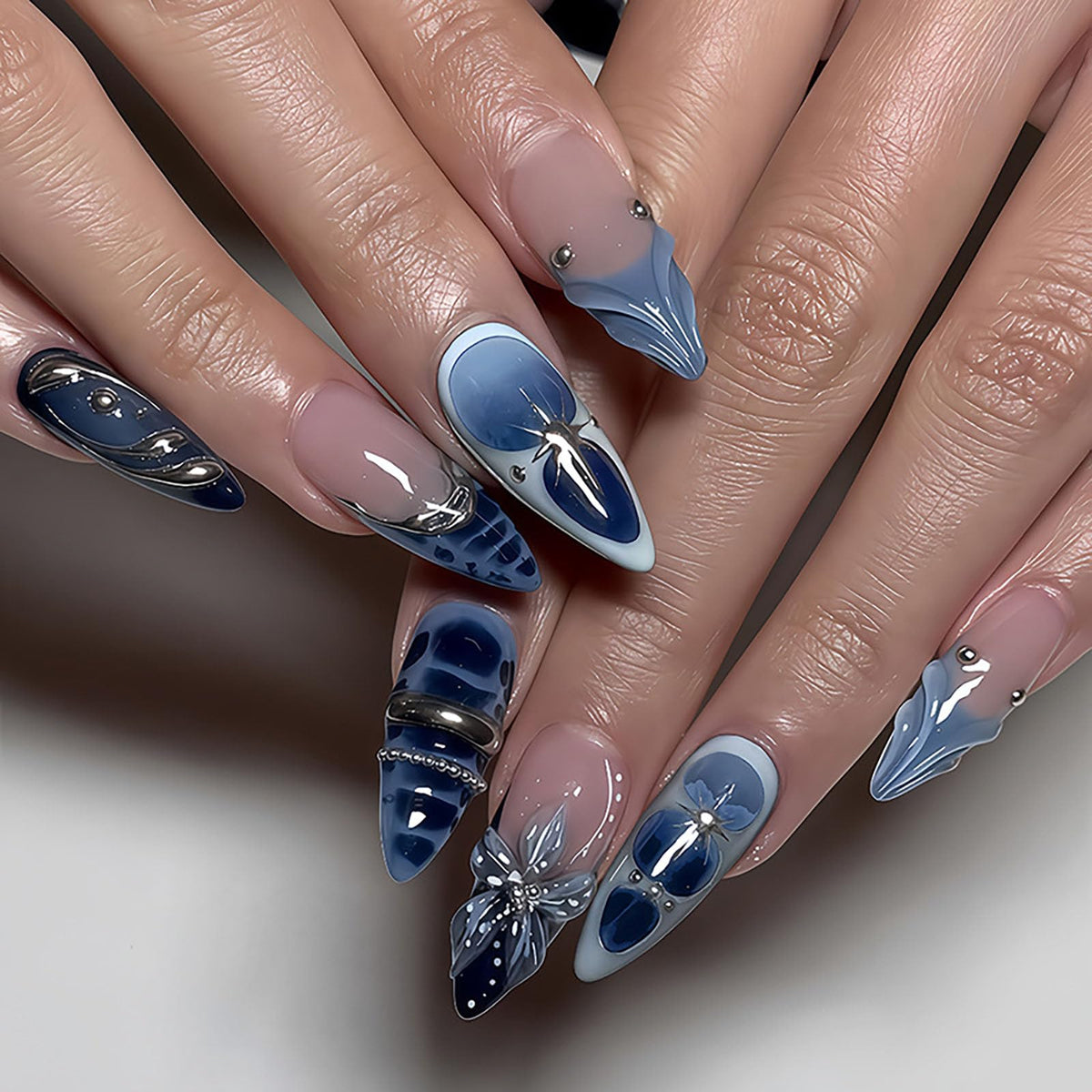 RUOKEXIN Almond Press on Nails French Tip Fake Nails Medium False Nails with 3D Flower Designs Blue Spring Nail Press ons Sparkly Artificial Nails for Women 24Pcs