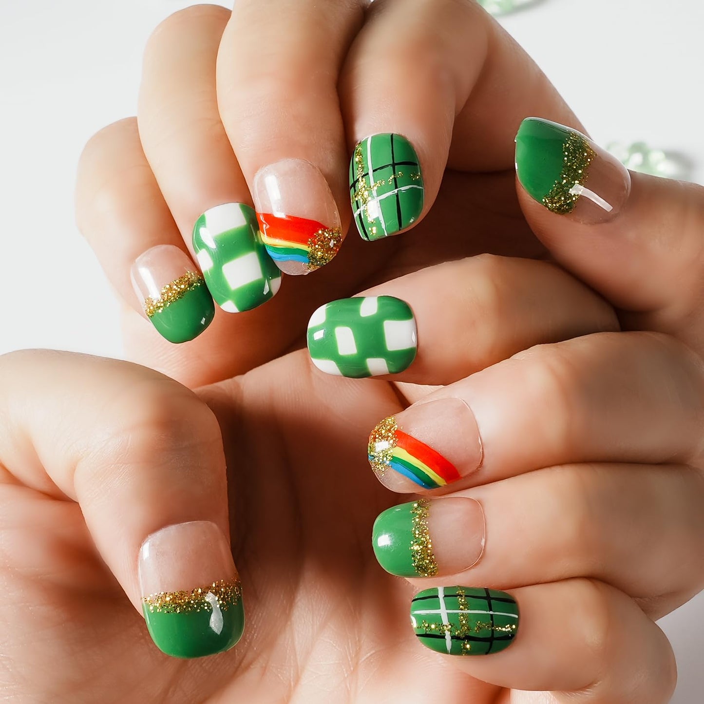 Tesytto Extra Short Press On Nails - Nude Base with Green French Tips & Gold Glitter, Hand-Painted Plaid & Rainbow,Easy to Apply & Remove (Size M)