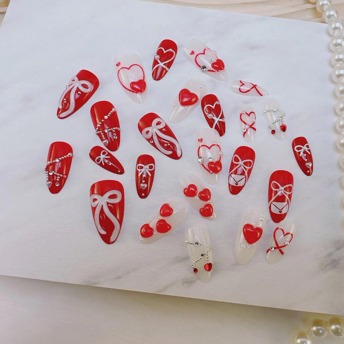 24Pcs Valentine's Love Press on Nails Almond Red Heart Fake Nails with 3D Bow Rhinestones Design French Tip False Nail White Pearl Stick on Nails Hearts Romantic Y2k Handmade Nail for Women