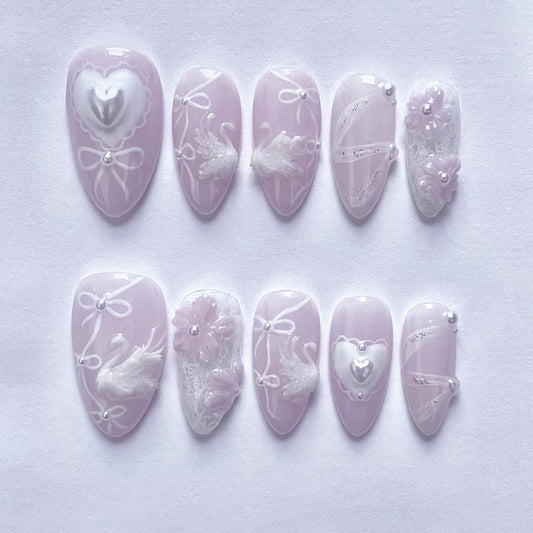 3D White Swan Press on Nails Short Almond Fake Nails Cute Flowers False Nails with Peals Charms Designs Nails White Bow Heart Acrylic Nails Purple Full Cover Stick on Nails for Women Nails Decor 24Pcs