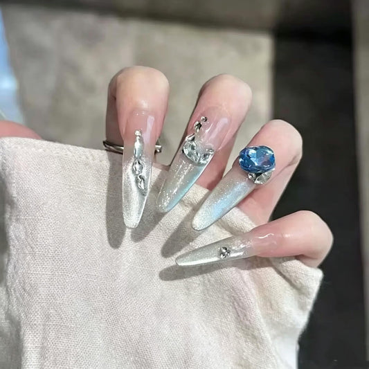 C.Z.Z.T.T.NAILS Nude Color Cat Eye Fake Nails, Long Almond Shaped with Blue Nail Art Rhinestones and Cat's Eye Gloss, 24pcs with Jelly Glue,Suitable for Parties or Gifts.