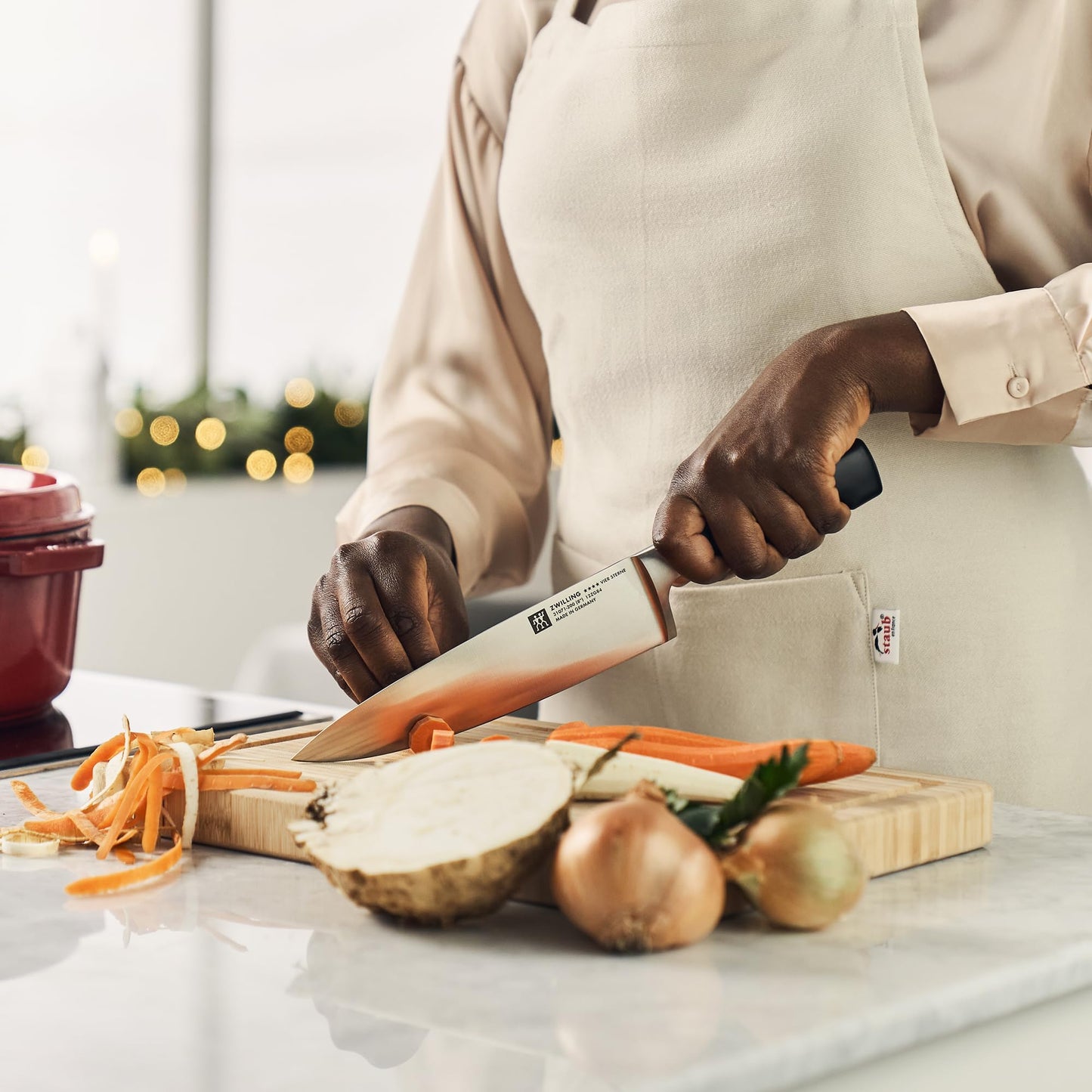 ZWILLING Four Star 8-inch Razor-Sharp German Chef's Knife, Made in Company-Owned German Factory with Special Formula Steel perfected for almost 300 Years, Dishwasher Safe