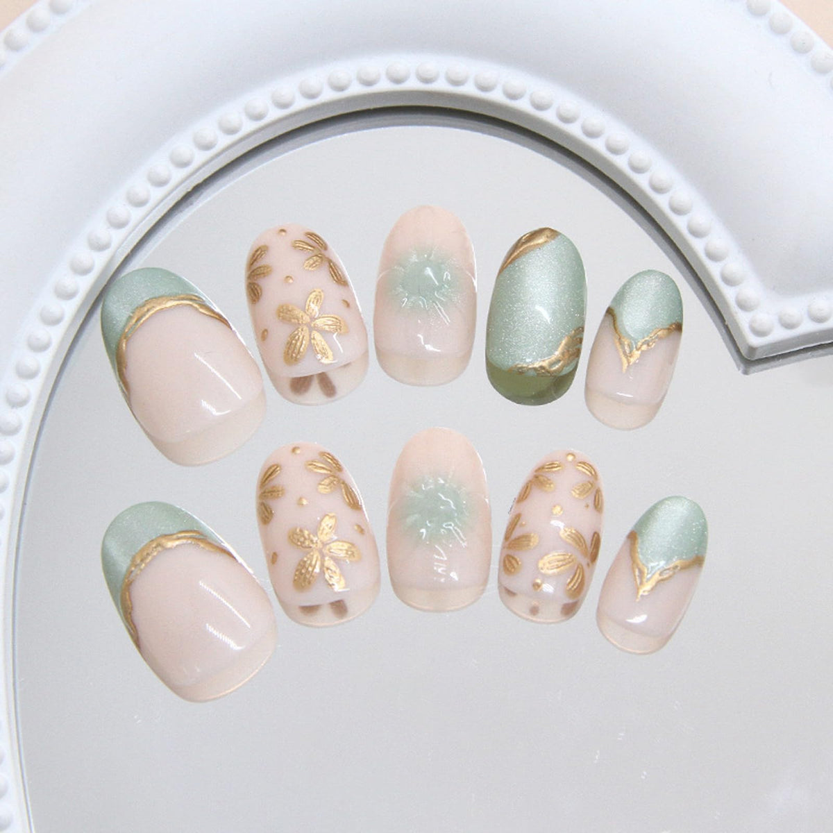 IMSOHOT Press on Nails Short Round Fake Nails Green Cat's Eye False Nails with Golden Flower Designs Glossy Full Cover Acrylic Summer Oval Cute Stick on Nails for Women Girls 24Pcs