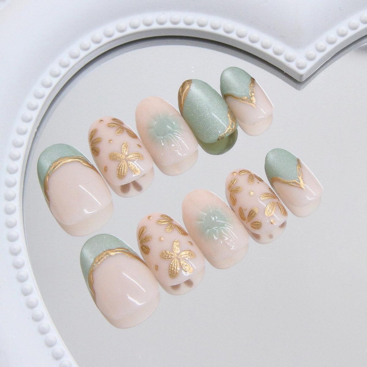 IMSOHOT Press on Nails Short Round Fake Nails Green Cat's Eye False Nails with Golden Flower Designs Glossy Full Cover Acrylic Summer Oval Cute Stick on Nails for Women Girls 24Pcs