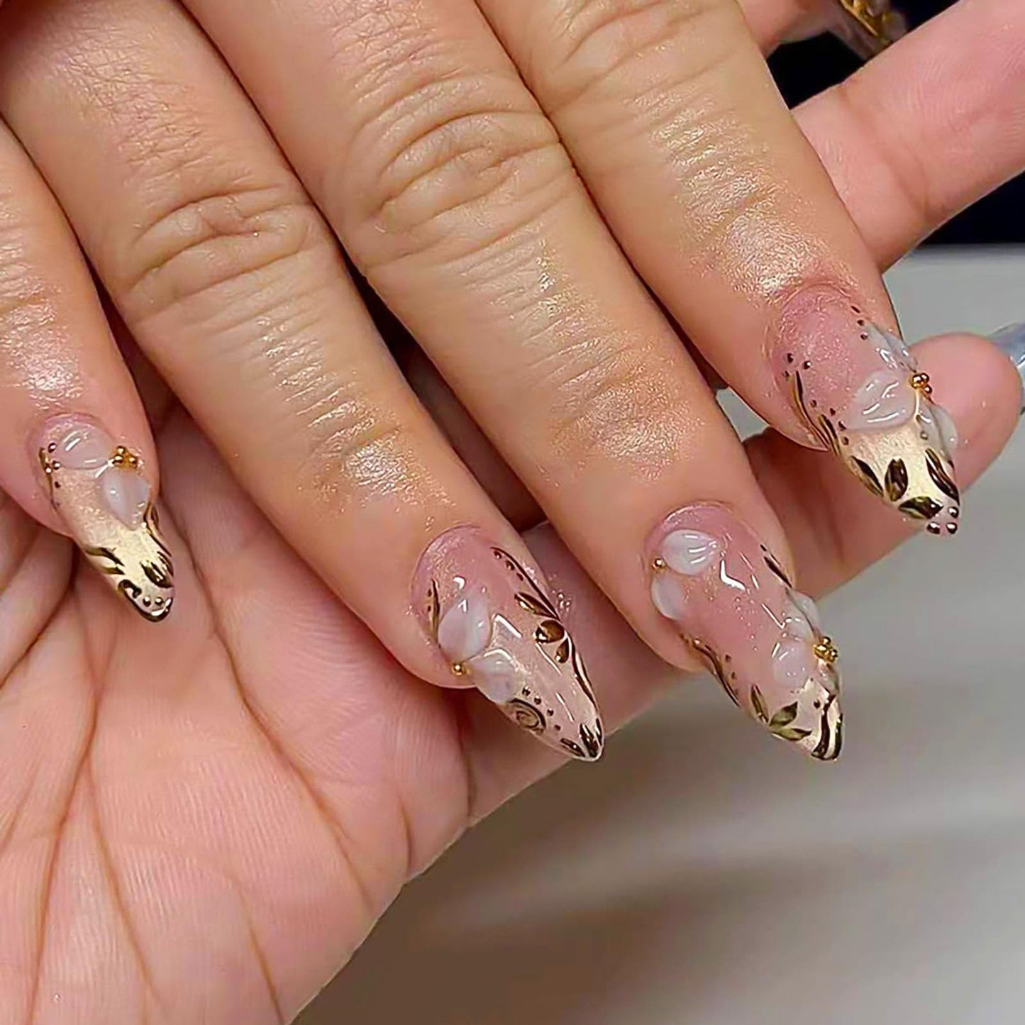RUOKEXIN Long Almond Press on Nails Gold Cat Eye Fake Nails Ombre False Nails with Flower Designs Stiletto Nail Press ons Sparkly Artificial Nails for Women 24Pcs