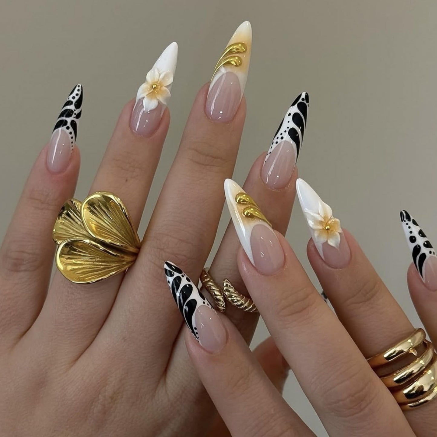 Almond Press on Nails Long Fake Nails Black Acrylic Nail Press ons Seeneey Gold Charm and Floral Designs Cute Stick on Nail for Women 24pcs