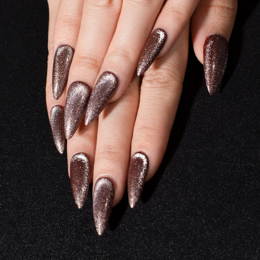 Gentle Claws Press-On Nails, Syrup - 24 Pcs Reusable Acrylic False Nails in Stiletto Shape, Medium Long Almond with Cat Eye Design, Full Well Tips, Pink Shimmery Finish, for Women and Girls