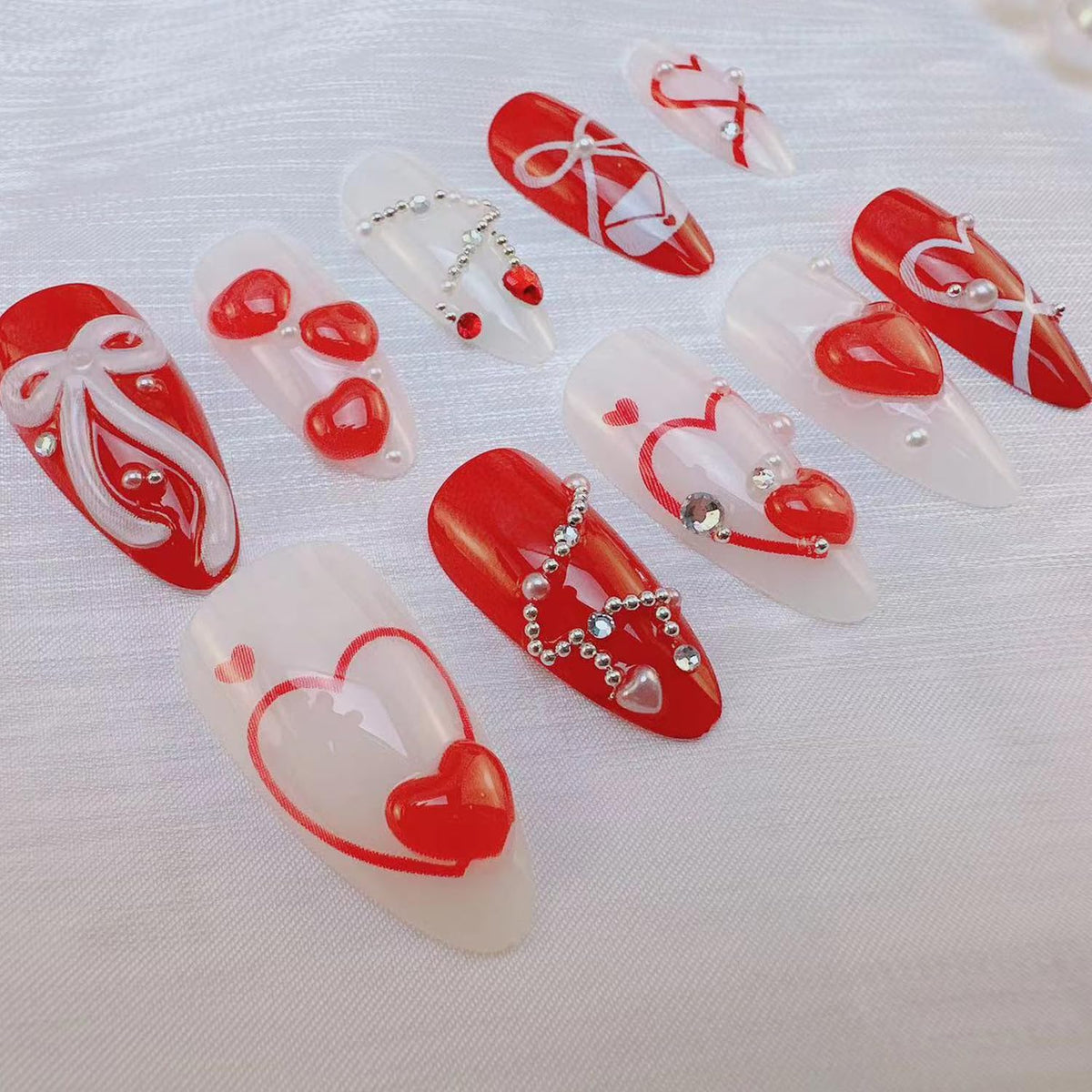 24Pcs Valentine's Love Press on Nails Almond Red Heart Fake Nails with 3D Bow Rhinestones Design French Tip False Nail White Pearl Stick on Nails Hearts Romantic Y2k Handmade Nail for Women