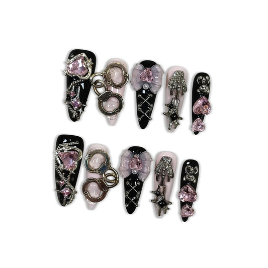 Hantyer Gothic Y2K Press on Nails, Long Stiletto Glossy Nails in Black & White, Handmade Nails with 3D Charms (Bow/Handcuff/Skull) & Heart Rhinestones, Edgy Party Style for Women(Size M)