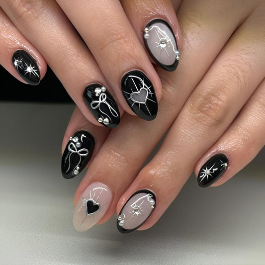 Black Press on Nails Short Almond Fake Nails Silver Bow Heart Nails Press Ons Star False Nails with Rhinestones Design Glossy Glue on Nail DIY Acrylic Stick on Nail for Women Decorations 24Pcs