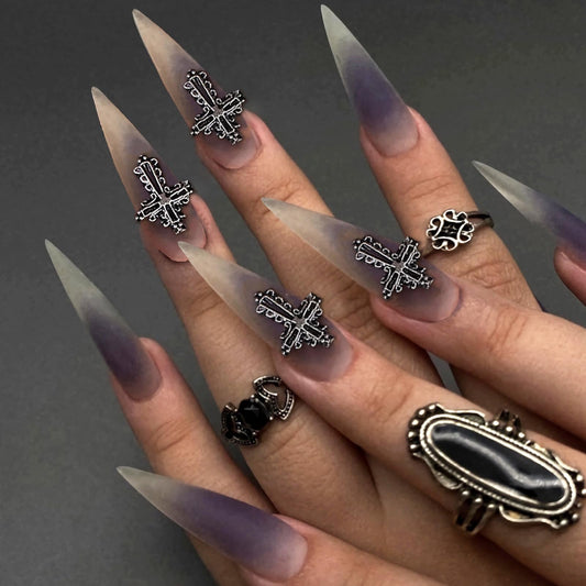 IMRAIN Press on Nails Long Stiletto Fake Nails Purple Ombre Matte False Nails with Metal Cross Charms Designs Goth Nail Art Glue on Nails for Women Girls 24Pcs