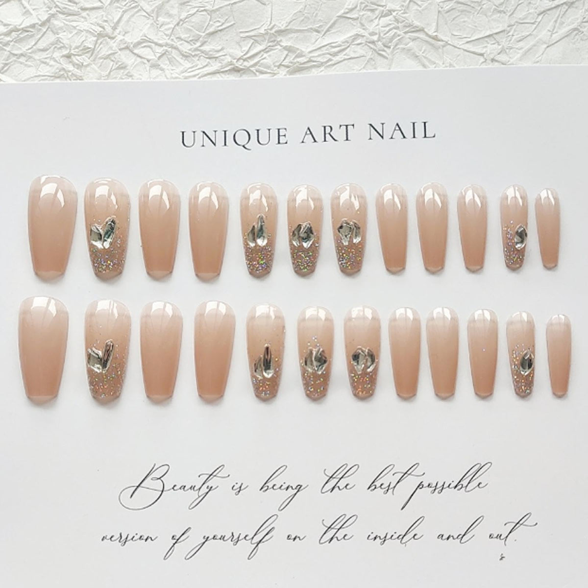 Hkanlre Rhinestones Press on Nails Nude Long Fake Nails Tips Full Cover Coffin False Nails for Women and Girls 24PCS