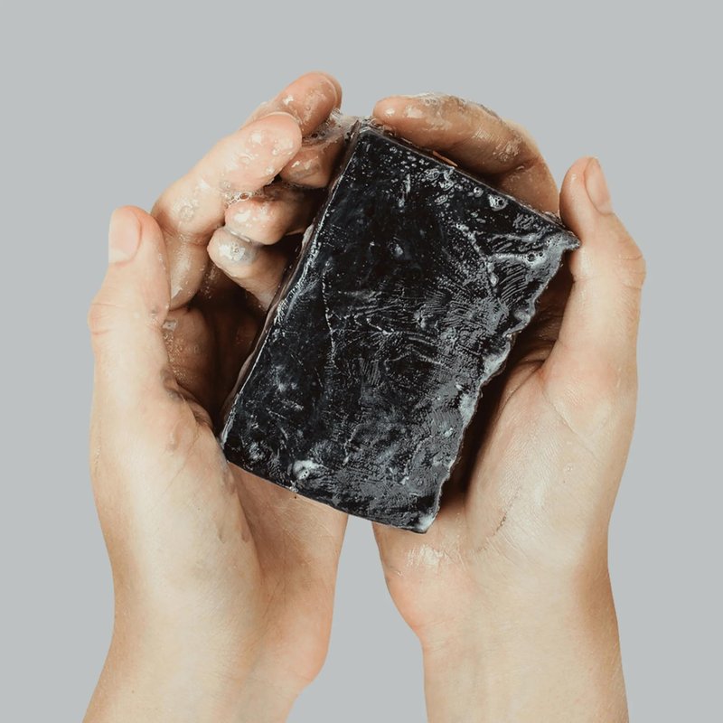 T.Taio Esponjabon Charcoal Soap Sponge - Cleansing Shower Scrubber - Cleaning Bath Wash Scrub - Oil Removal - Massage & Lather Foot, Elbow, & Face - Bathroom Accessories - Charcoal, Mini Soap Included