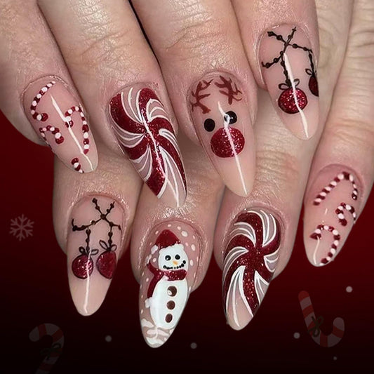 Xmas Press on Nail Medium Length Fake Nails Full Cover Almond Shape Press ones with Deer Snowman Candy Cane designs Christmas Glue on Nails Glossy Red Cute Holiday False Nails for Women Holiday 24pcs