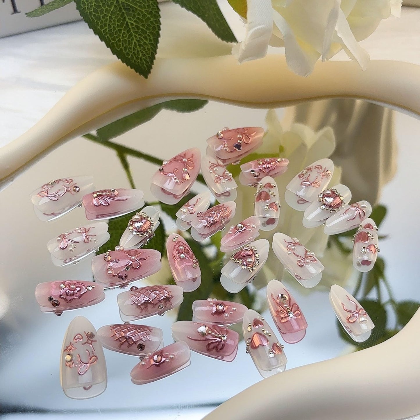 LBPEPAMZ Pink Press on Nails Medium Almond Fake Nails with 3D Heart Pearl Rhinestones Designs White Gradient Bow Silver Star Stick on Nails Flower Charms Full Cover Glue on Nails for Women Girls 24Pcs