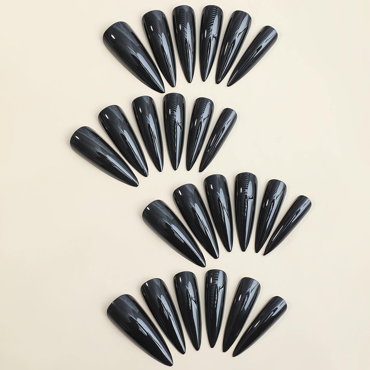 IMSOHOT Stiletto Press on Nails Extra Long Fake Nails All Black Glossy False Nails with Designs Full Cover Solid Color Acrylic Almond Glue on Nails for Women 24Pcs