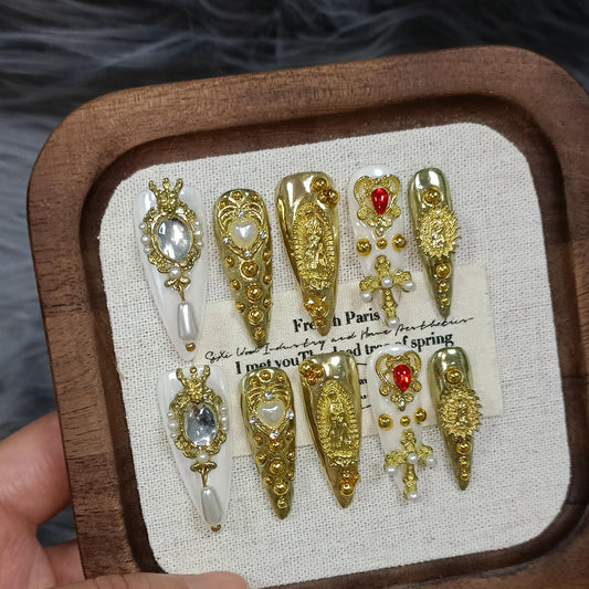 TENPAL 10Pcs Handmade Royal Press On Nails With Tools,Metallic Gold Long Stiletto Fake Nails with Pearl & Celestial Charms Designs,Sculpted 3D Baroque Acrylic Glue on Nails for Wedding Gothic Ball(M)