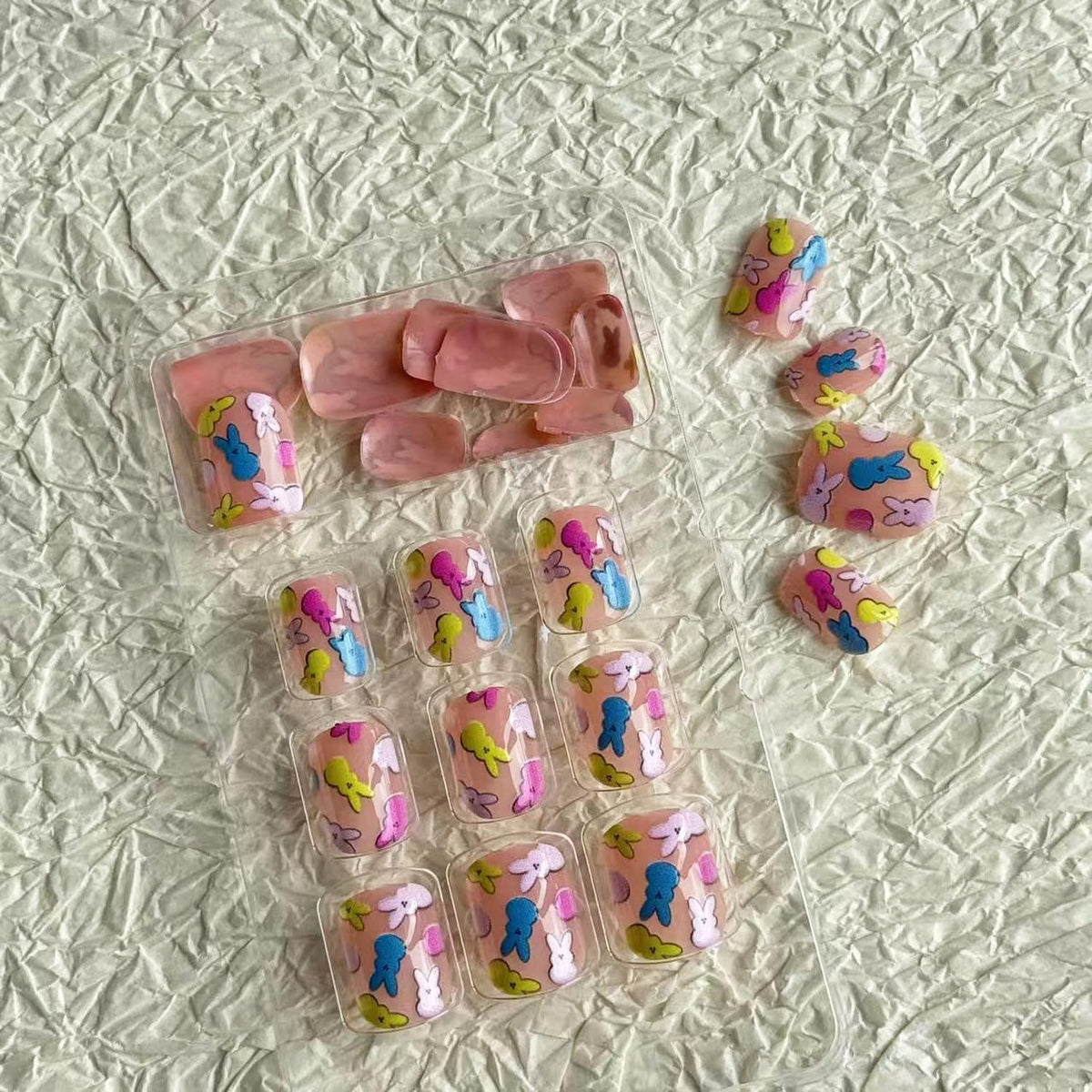 24pcs Easter Press on Nail Short Square Fake Nails Cute False Nails with Funny Bunny designs Colorful Stick on Nail Glossy Nude Pink Press ones Full Cover Reusable Glue on Nails for Women Girls