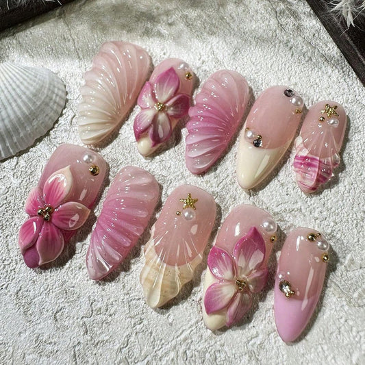 Cute Flower Press on Nails Medium Almond French Tip Fake Nails 3D Pink Gradient Flowers False Nails with Rhinestone Gold Beads Charms Design Acrylic Nails Golden Starfish Glue on Nail for Women 30Pcs