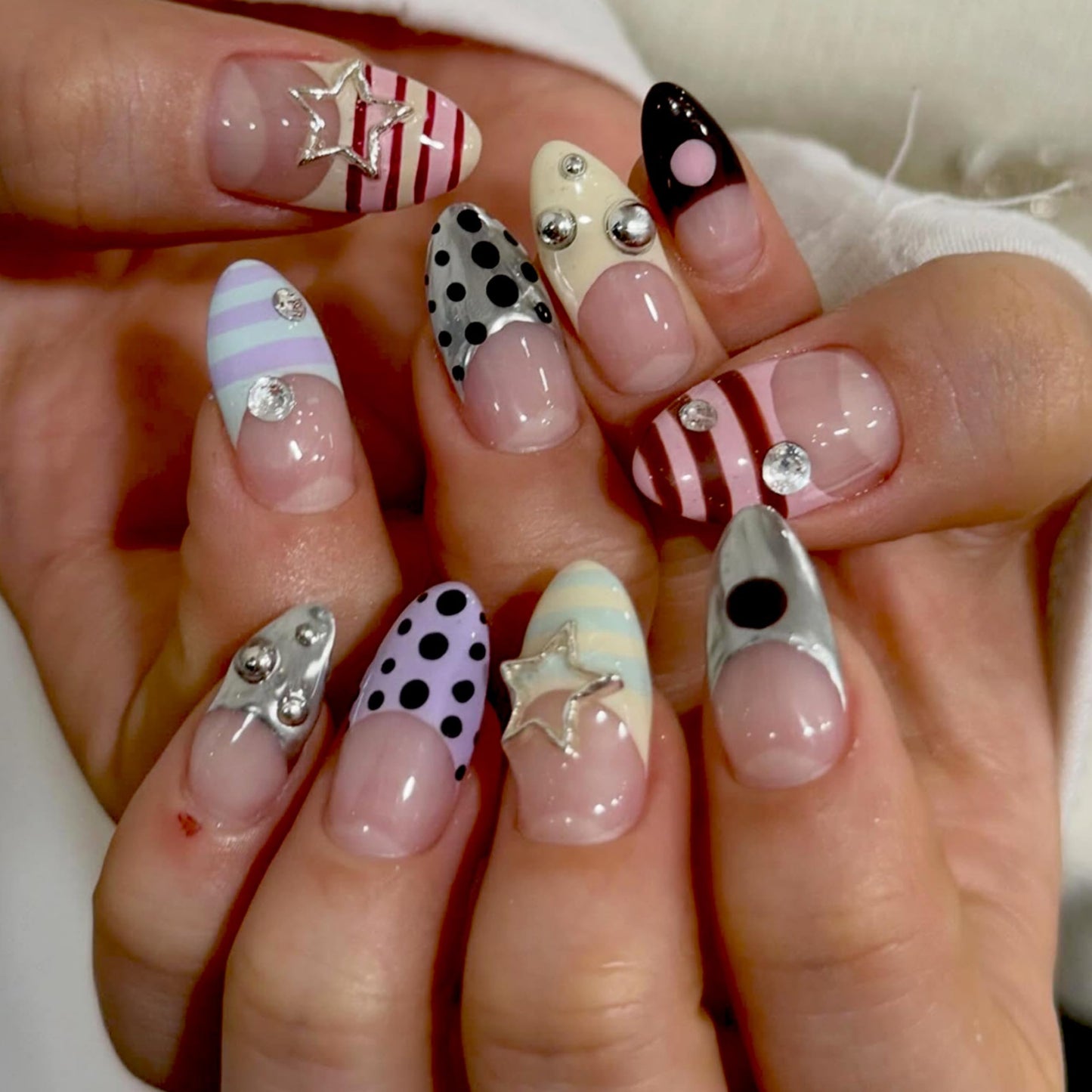 Long Press on Nails Almond Fake Nails Acrylic Nail Press ons Seeneey Silver Charm Y2K Rhinestones Designs Beach Stick on Nail for Women 24pcs